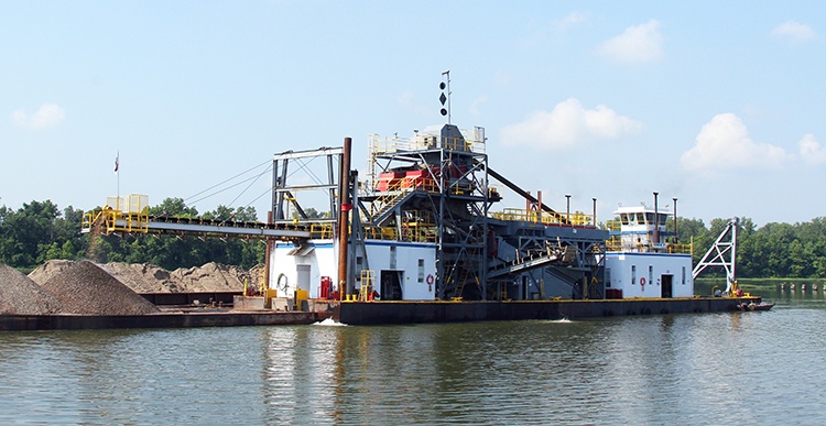 1999: JSC finishes construction on the 'Cora J' dredge and puts it into service.